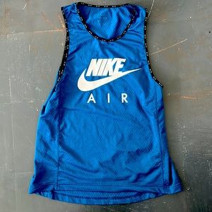Nike dri-fit tank top. Great for working out! Women’s size small.
